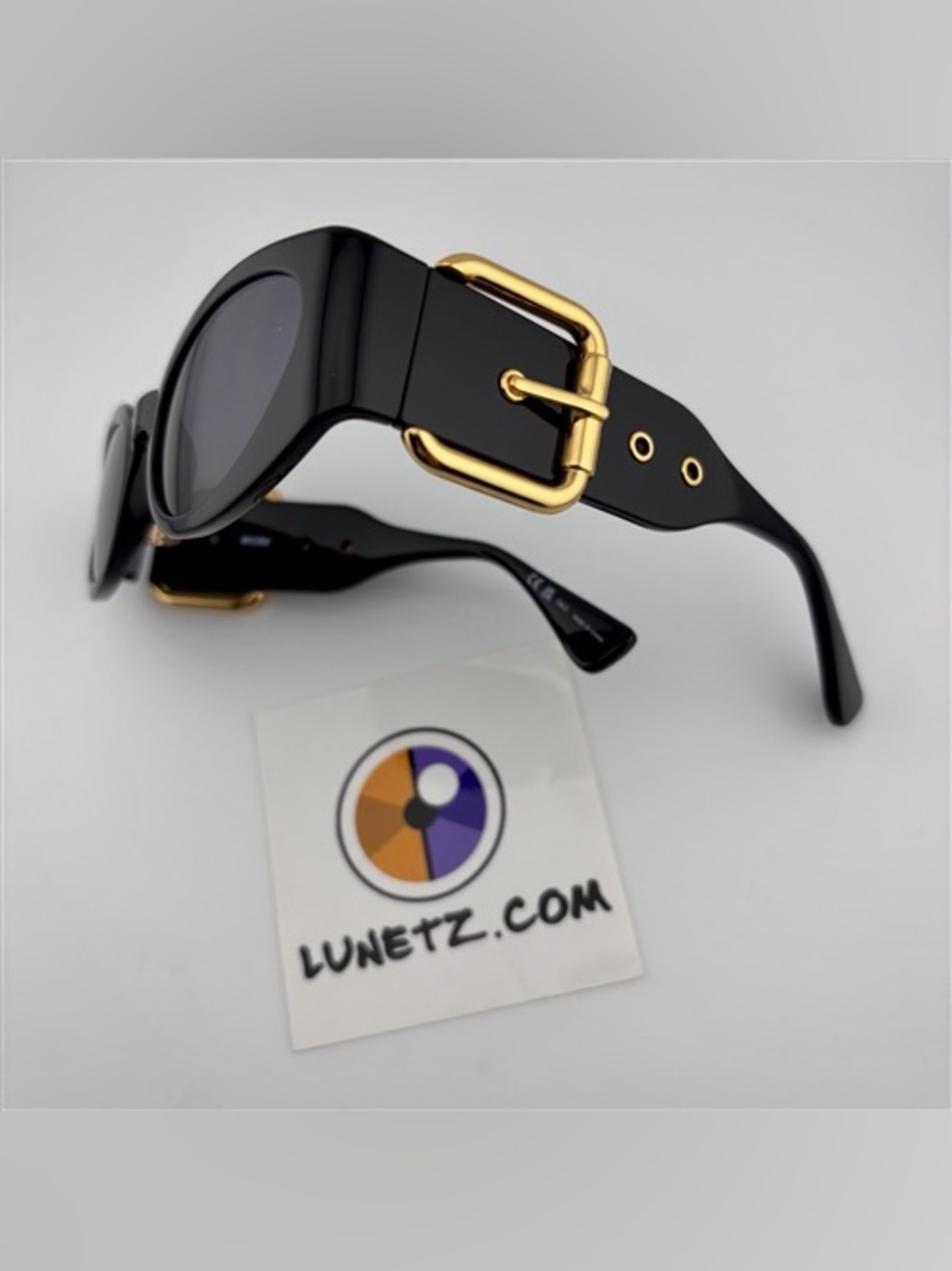 Moschino Black Sunglasses with Gold Buckle Accent
